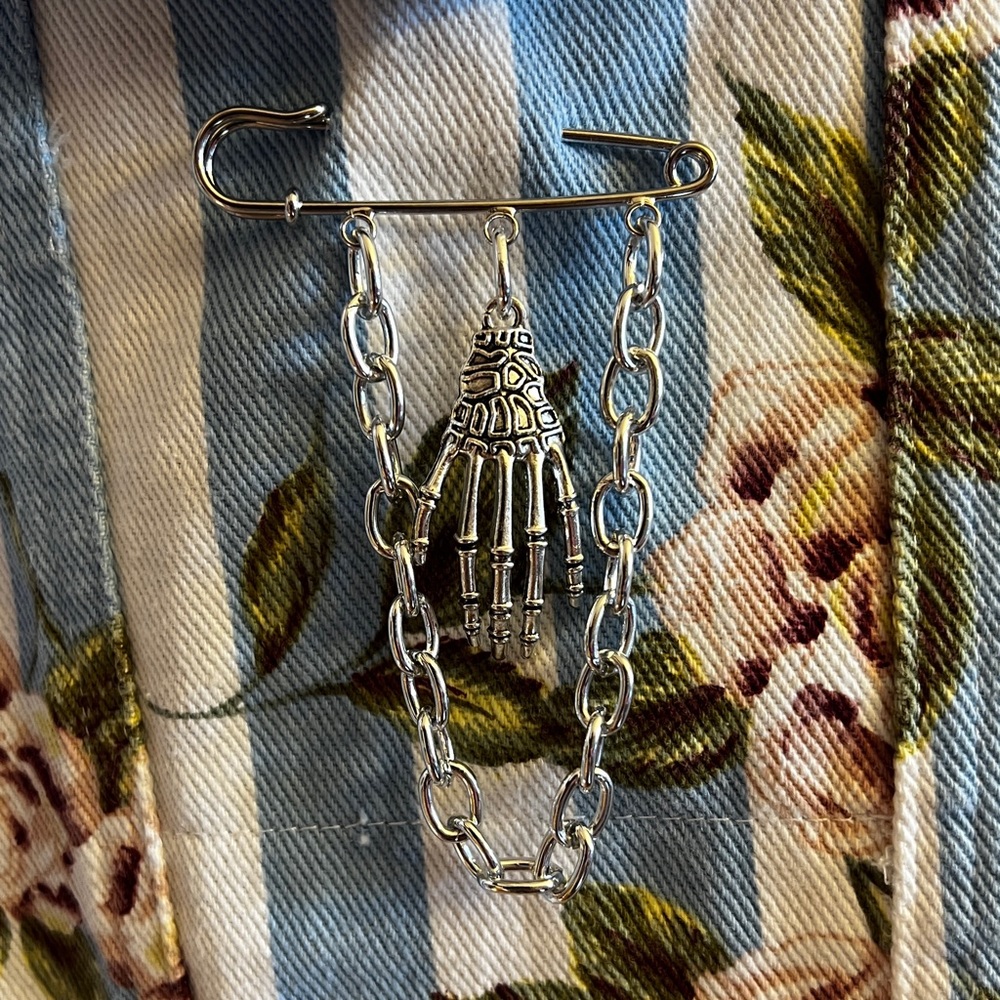 Skeleton hand punk pin with chain